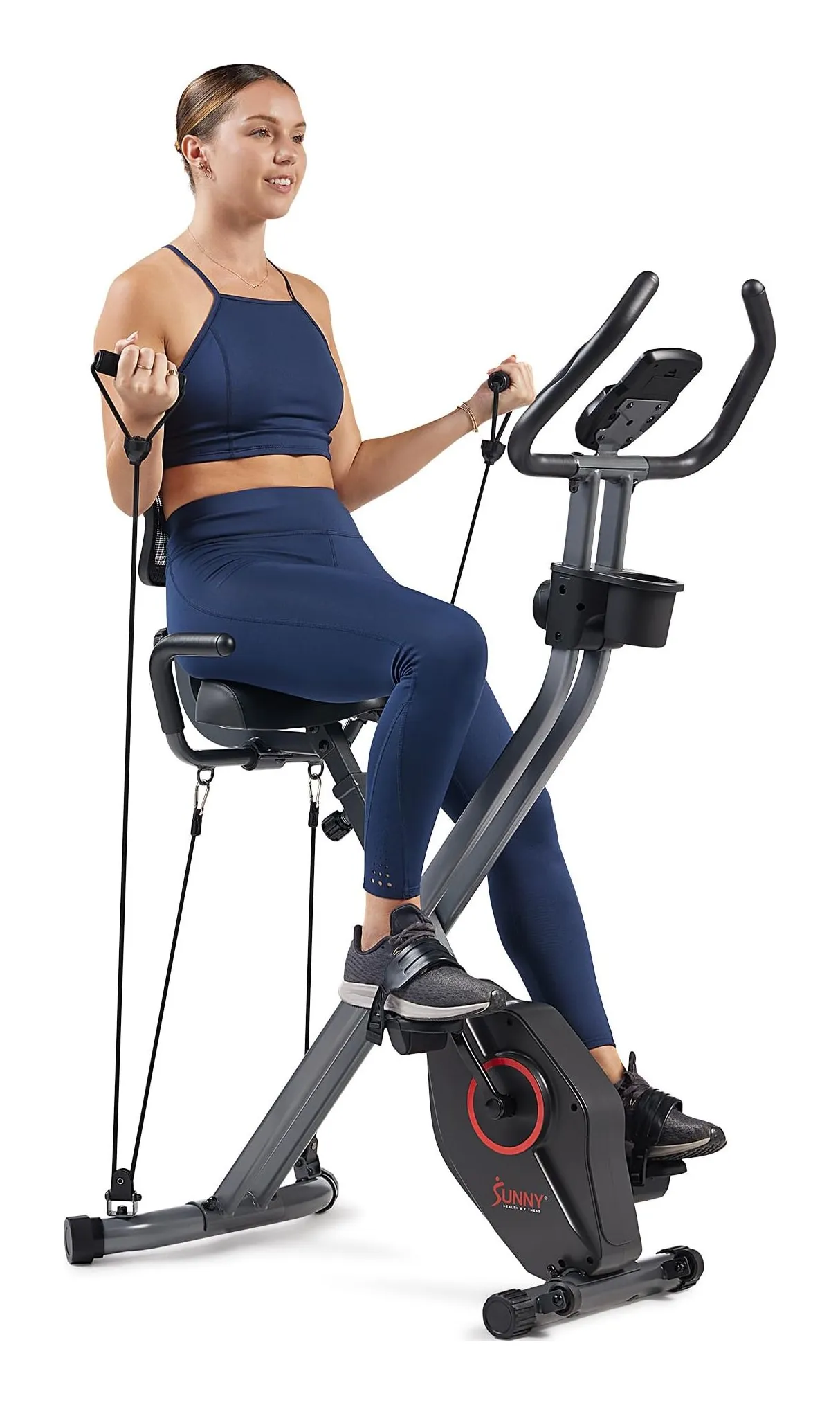 Sunny Health & Fitness Smart Folding X-Bike in black with a mesh backrest and resistance bands on the frame