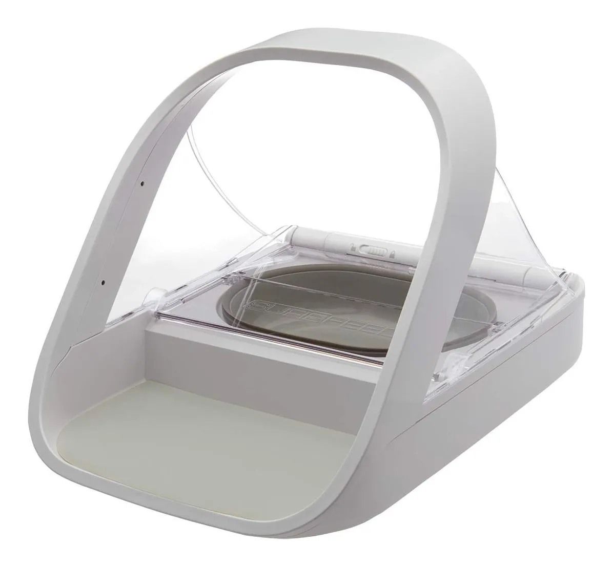 SureFeed microchip pet feeder in white with its lid closed over a grey bowl, an RFID collar tag beside it